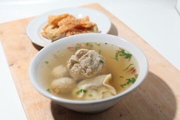 Bakwan Malang or Bakso Malang, traditional food from Malang, Indonesia. Meatball soup is served with other foods