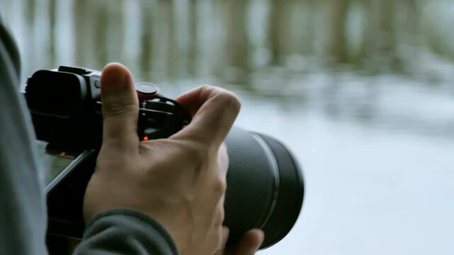 Video camera shoot scene, handheld, close-up, cameraman, video camera, photographer videographer filming outdoors, filming camera, recording camera, production, director