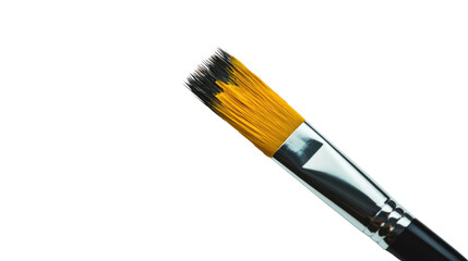 Fototapeta premium Close-up of a paintbrush with yellow bristles on a white isolated background, perfect for art and creativity themes.