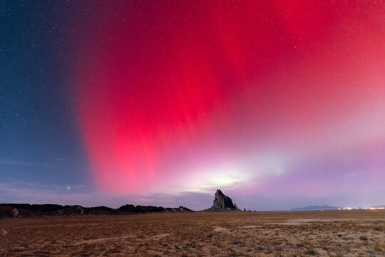 Aurora Borealis or Northern Lights over Shiprock, New Mexico