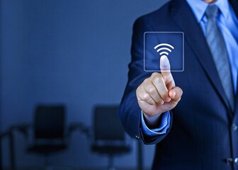 Businessman Interacting with a Virtual Screen Showcasing WiFi Icon - Business Technology