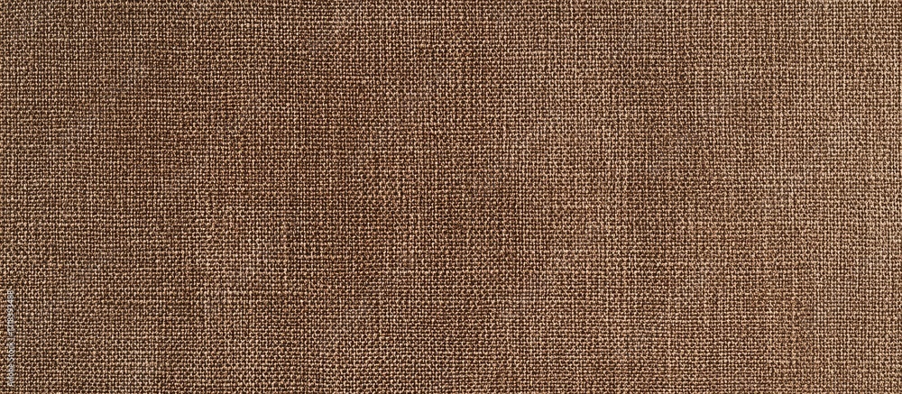 Aufkleber textured medium brown fabric background featuring a rich warm hue with subtle woven patterns enhanci