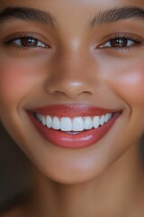 Fototapeta premium Smiling individual showcasing perfectly aligned and bright teeth, captured in a warm, natural light setting that accentuates facial features and radiant expression