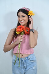 girl with flowers. girl with gerbera flowers. smile and flowers. happy woman with flowers. greeting card,