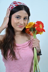 woman with flowers. girl with gerbera flowers. smile and flowers. happy woman with flowers. greeting card,