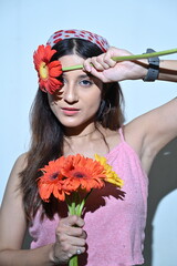 portrait of a girl with daisy flowers. girl with gerbera flowers. smile and flowers. happy woman with flowers. greeting card,