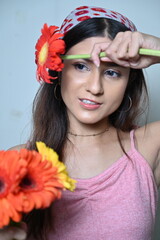 portrait of a girl with flowers. girl with gerbera flowers. smile and flowers. happy woman with flowers. greeting card,