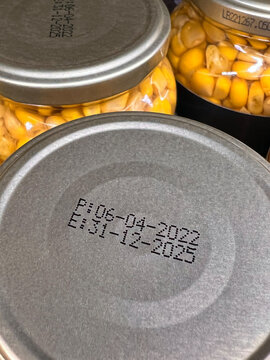 Closeup image of production and expiry dates on food product (kernel corn)