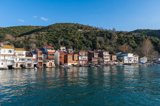 View of waterfront houses small fishing town in Asian side of the city. Anadolu Kavağı, Istanbul, Turkey.