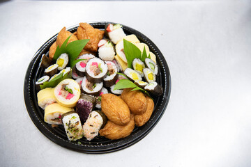 Assorted okazuya sushi platter in Japanese deli