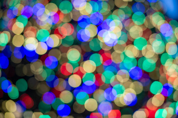 Bokeh out of focus abstract colored circles Christmas tree lights