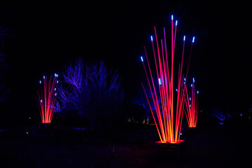 Illuminated Light Installation with Vibrant Red and Blue Colors at Night
