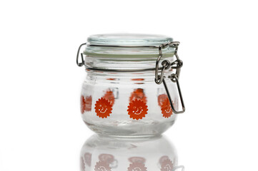 Colorful jar with cheerful design captures attention in a bright kitchen setting
