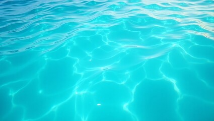 Obraz premium Vibrant turquoise water surface with gentle ripples.