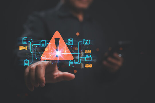 Cybersecurity Alert Data Breach Notification, Warning symbol emerges as user interacts with data-driven technology, emphasizing importance of cybersecurity awareness