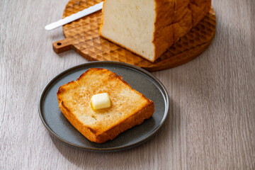 Buttered toast and white bread.
Delicious white bread image.