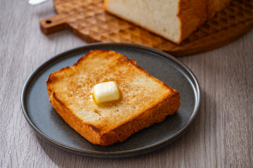 Buttered toast and white bread.
Delicious white bread image.