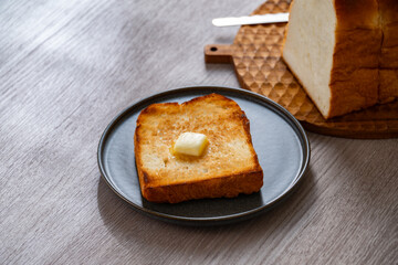 Buttered toast and white bread.
Delicious white bread image.