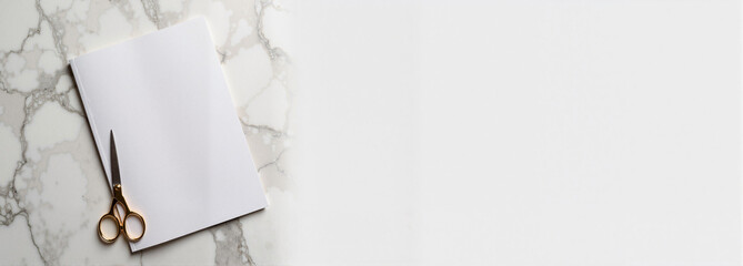 Magazine mockup with scissors on marble background