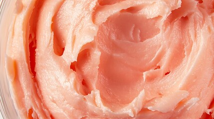 Close up view of a pink creamy substance