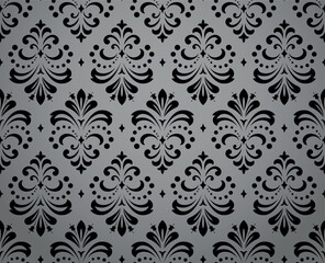 Wallpaper in the style of Baroque. Seamless vector background. Gray and black floral ornament. Graphic pattern for fabric, wallpaper, packaging. Ornate Damask flower ornament