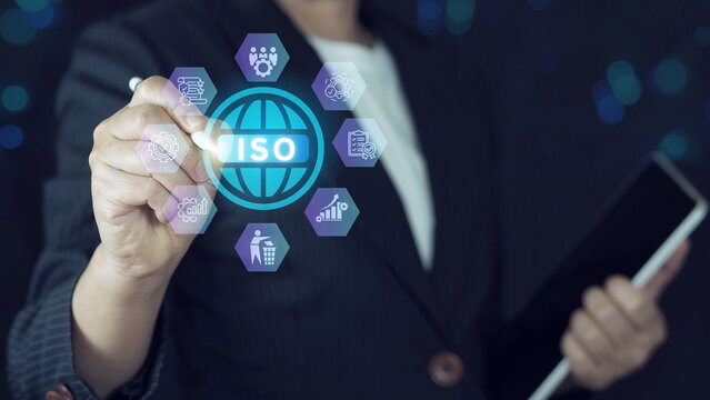 Businessman using smartphone to choose ISO 9001 on virtual screen. QMS, ISO 9001 Quality Management System concept. Certified and quality management of organizations