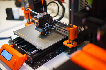 3d printer prototype object machine display orange parts
