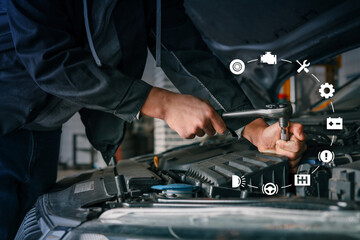 Mechanic using wrench to fix car engine, with virtual automotive icons representing various diagnostics and maintenance services displayed around the image