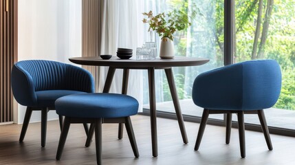 Fototapeta premium A Cozy Corner With Dark Wood Furniture And Blue Velvet Chairs. Natural Light Streams In From A Large Window, Creating A Serene Atmosphere.