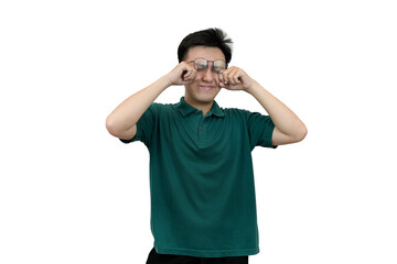 Fototapeta premium young asian man looking sleepy in a white isolated background
