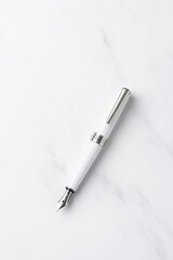 Sleek writing instrument resting on smooth marble surface showca
