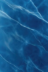 Elegant blue marble pattern with flowing white veins, evoking tr