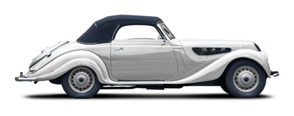 
Classic European retro car in white. With a convertible body and a soft top in black.