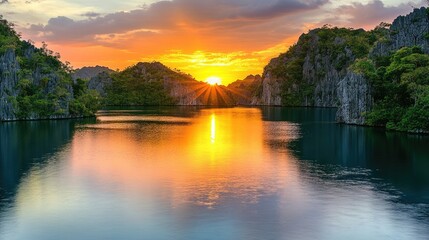 Obraz premium A colorful sunset above a tropical island, with crystal-clear waters reflecting the hues