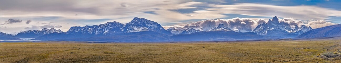 Expansive view of mountains near El Chalten with dramatic skies and open Patagonian landscape