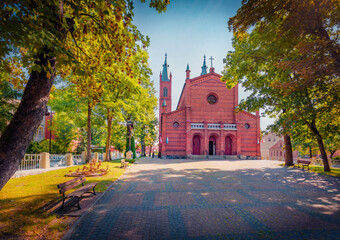 Fototapeta premium Spectacular summer cityscape of Kwidzyn town, northern Poland on the Liwa River, Poland, Europe. Nice morning view of Gdanisko tower of Castle Museum in Kwidzyn. Traveling concept background.