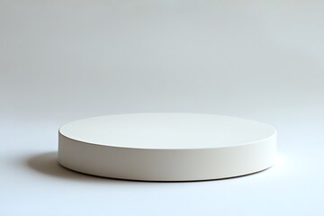 A blank white podium or pedestal display, set on a pristine white background. The empty space is ideal for showcasing a product or concept.