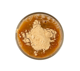 Maca powder drink isolated, dry Peruvian ginseng beverage, powder in water, ground ayak willku tea