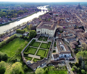 Aerial view of Almo Collegio Borromeo palace and garden in Pavia, Italy