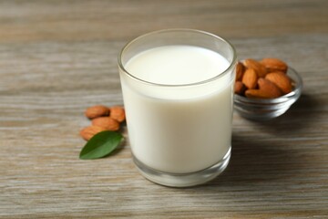 Glass of almond milk on the table 