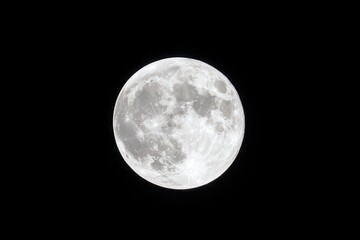 Fototapeta premium Full moon in night sky with detailed lunar surface