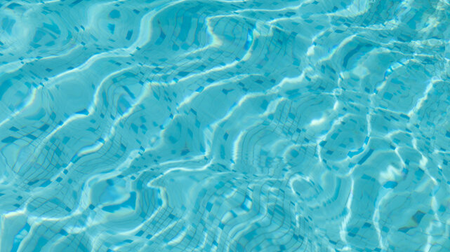 crystal clear blue swimming pool water background with  ripples, sunlight waves and mosaic tiles on floor in summer