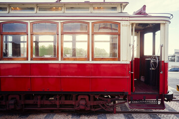 Vintage Red Tram in City Street