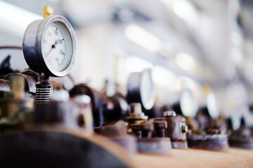 Close-Up of Industrial Pressure Gauge in a Mechanical Setting