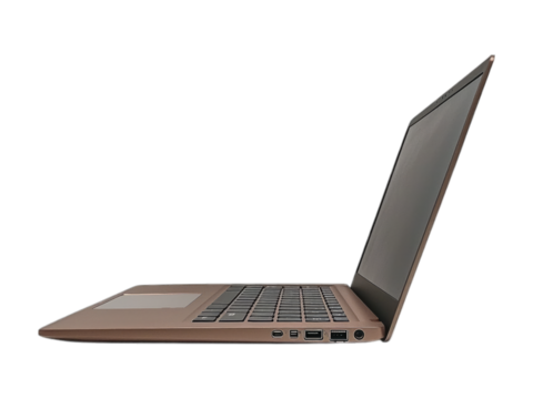 Rose gold laptop side view on dark background, ready for work