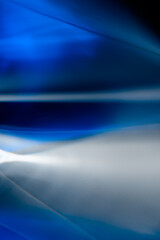 Abstract Blue and White Waves with Light Reflections..