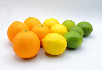 Citrus fruits with different colors. Oranges, lemons and lime. 