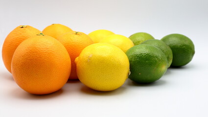 Citrus fruits with different colors. Oranges, lemons and lime. 