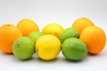 Citrus fruits with different colors. Oranges, lemons and lime. 