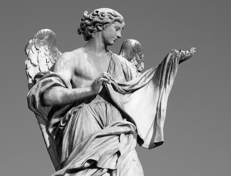 ROME, ITALY - SEPTEMBER 1, 2021: The statue of Angel with the Sudarium on the Ponte Sant'Angelo by Cosimo Fancelli (1620  - 1688).